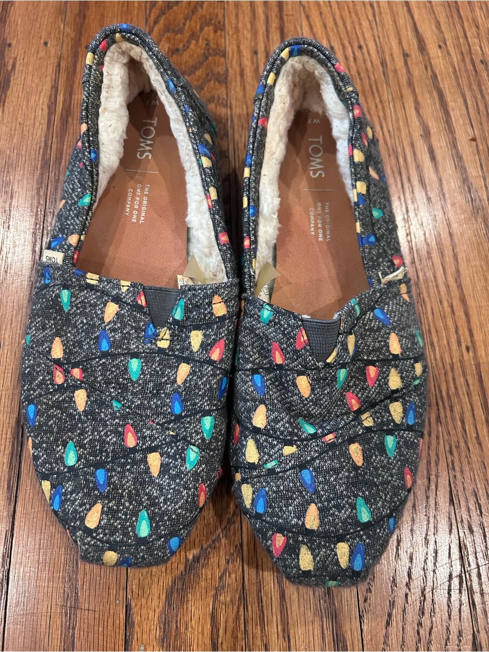Toms Kids Slip-On Moccasins in Black with Red, Blue, Green & Yellow Lights